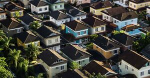 aerial view of lots of houses all squashed up together.