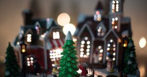Close up image of a doll christmas village