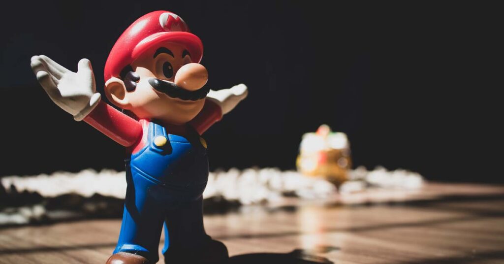 Wooden carving of Mario from super mario brothers