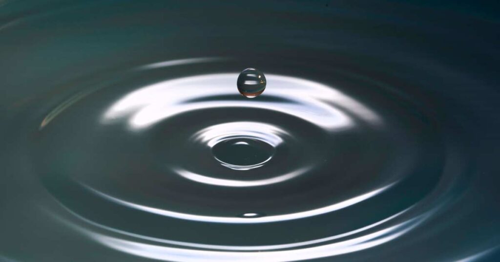 A Water droplet on a ripple of tiny waves in water